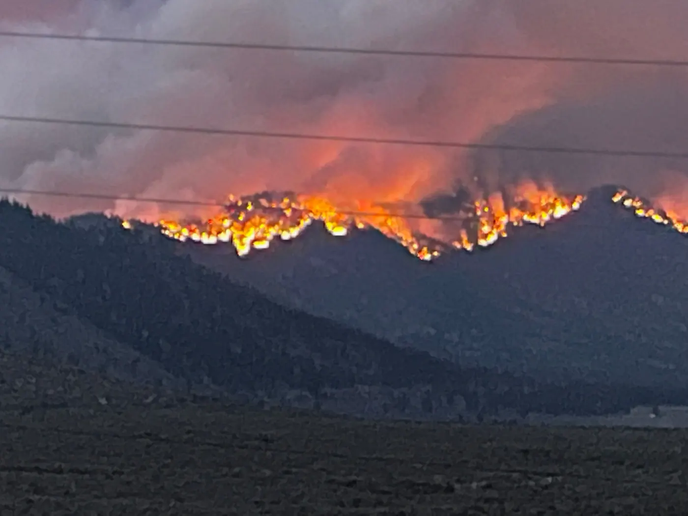 Two weeks later, the same mountains on fire.